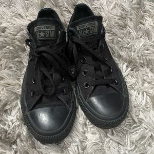 All black Converse Chuck Taylor’s